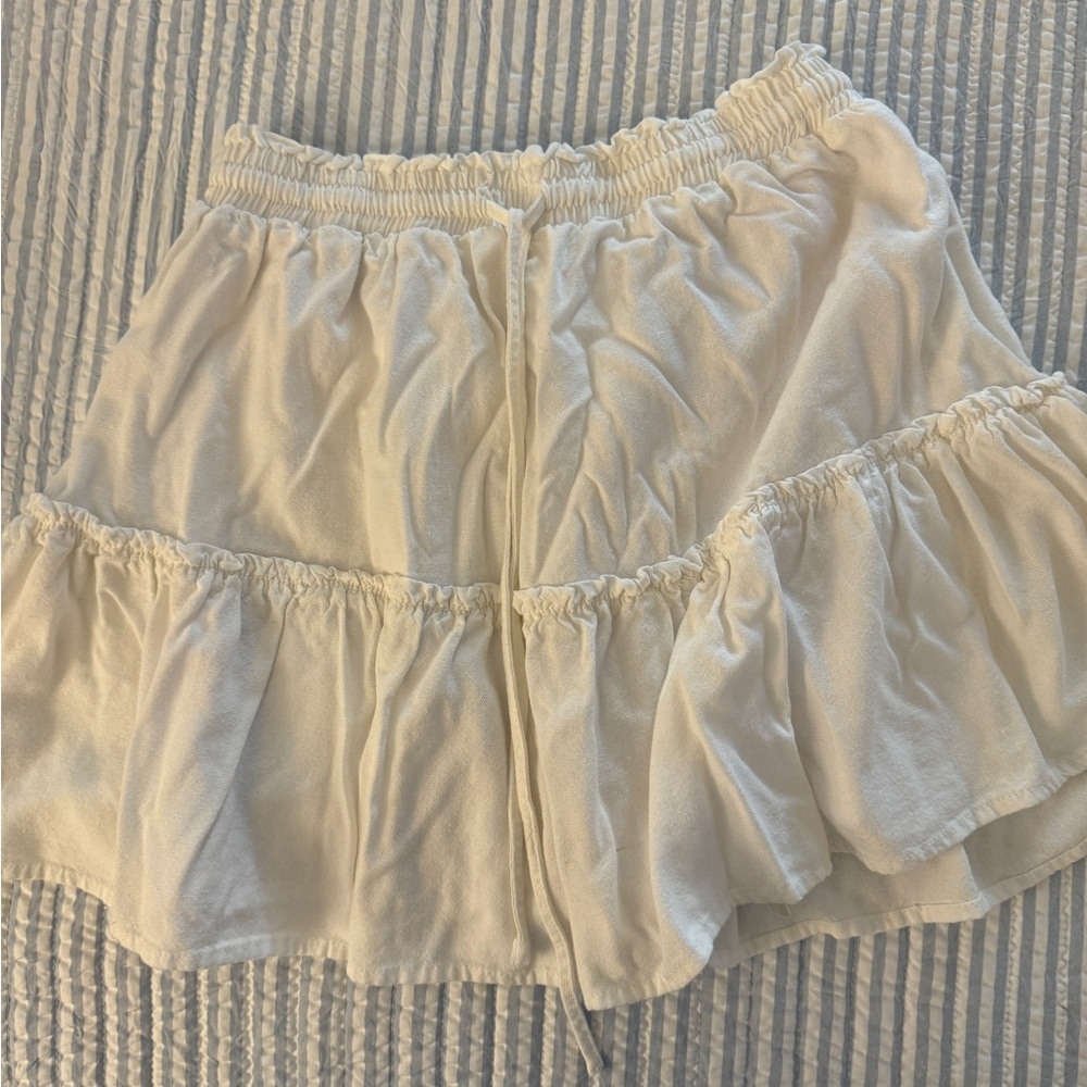 White ruffled skirt